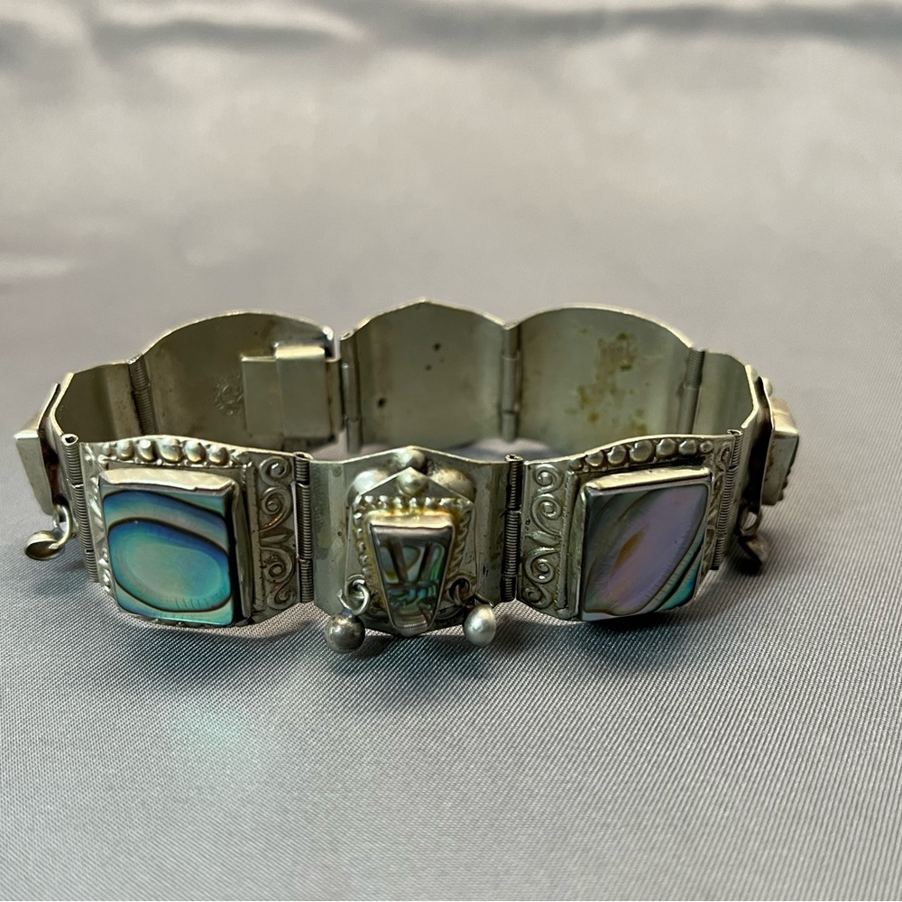 Elegant Silver Bracelet with Abalone Accents